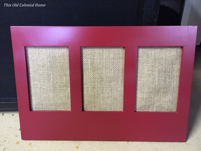 Red frame with burlap backing 