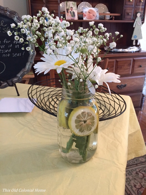 Daisy and lemon slice mason jar centerpiece