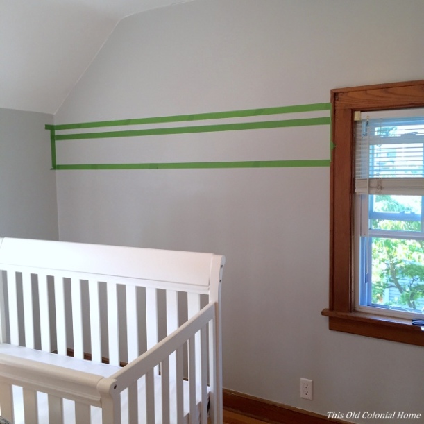 Paint stripes in nursery using Frog's Tape 